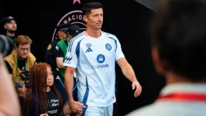 Robert Lewandowski walks onto the pitch before his Chicago Fire home debut at Soldier Field.